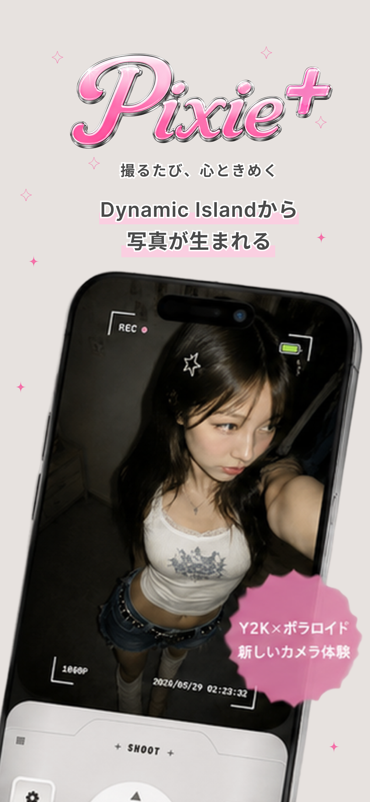 Pixie+ の撮影画面。Y2K デジカメ風のシルバー UI で、Dynamic Island から写真が生まれる様子